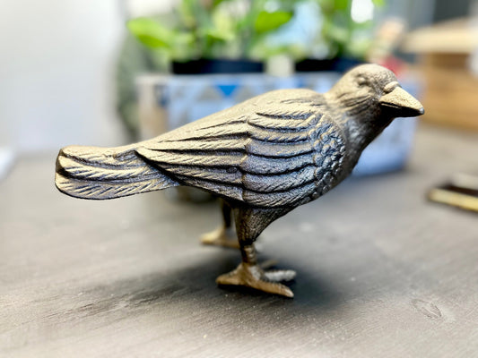 Corbeau en fonte, tête à côte, or antique