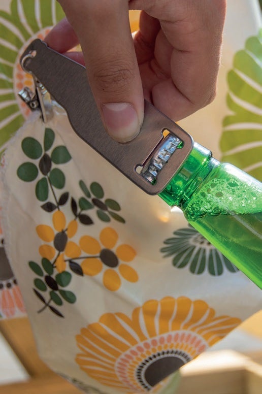 Poids de nappe avec ouvre-bouteille