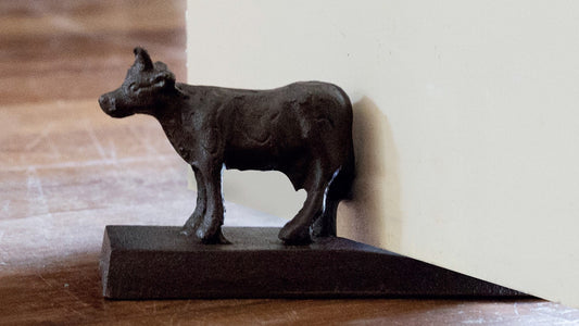 Doorwedge Cow