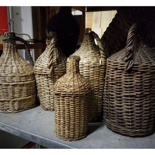 Antique Bottles in Wicker